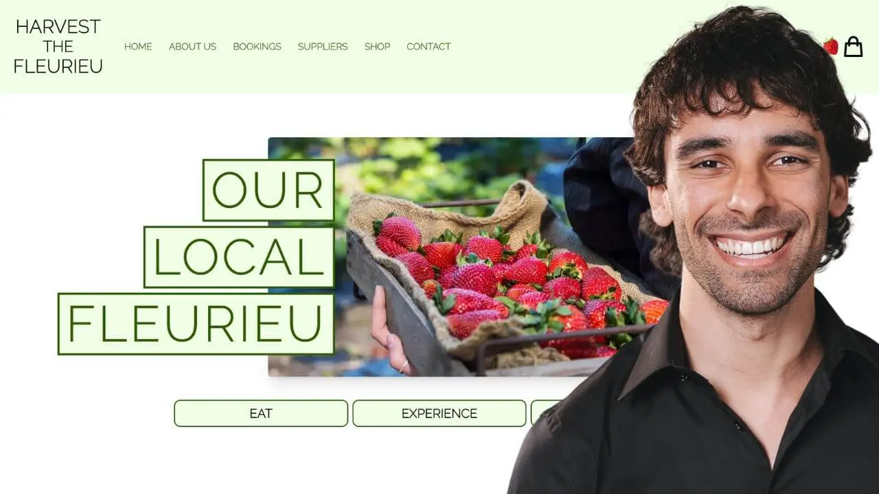 Sav Tripodi smiling in front of a background of Harvest The Fleurieu website.