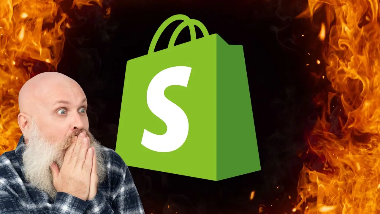 The Shopify logo in the middle of flames with a man with a grey beard reacting to flames.