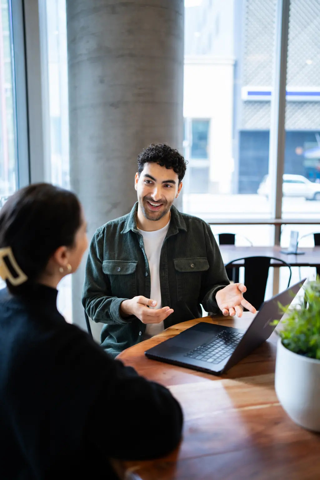 Dom consulting a client